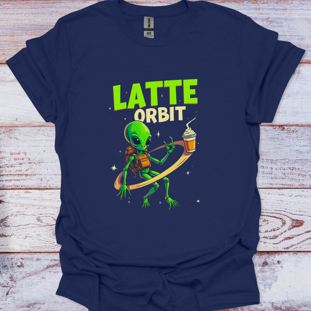Navy blue t-shirt with an alien holding a coffee cup and 'Latte Orbit' text on a wooden surface