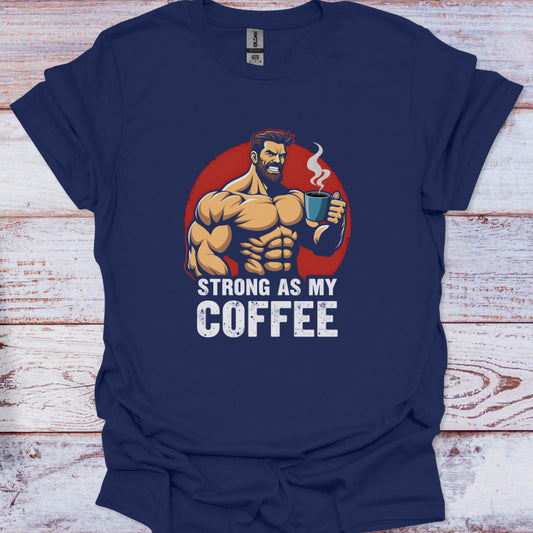 Navy blue t-shirt with a graphic of a muscular man holding a coffee cup and text 'Strong as my coffee' on a wooden surface.