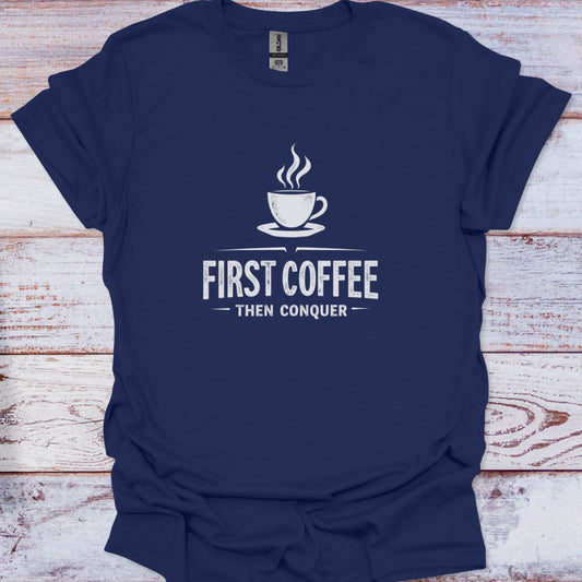 Navy blue t-shirt with white coffee graphic and text on a wooden surface