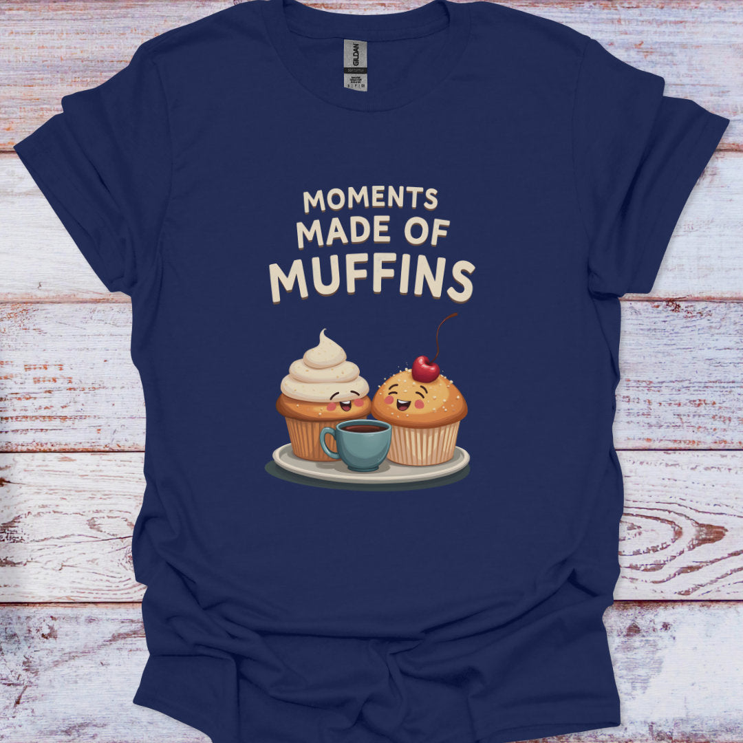 Navy blue t-shirt with cartoon muffins and coffee cup on a wooden surface