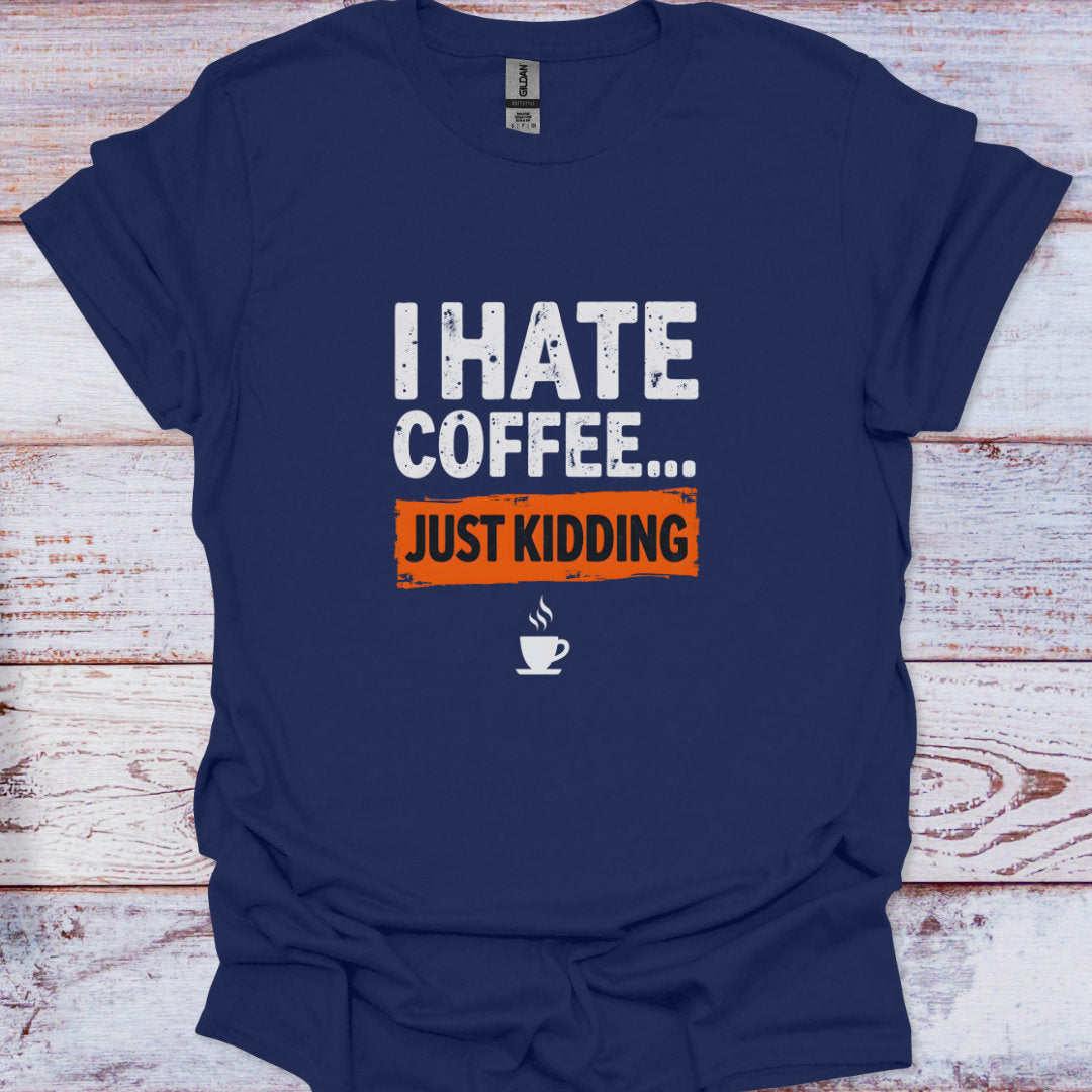 Navy blue t-shirt with humorous text design on a wooden surface
