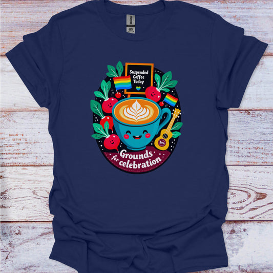 Navy blue t-shirt with a colorful coffee-themed graphic on a wooden surface