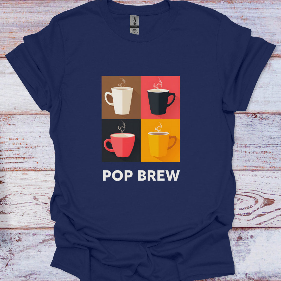 Navy blue t-shirt with colorful coffee cup design and 'POP BREW' text on a wooden surface