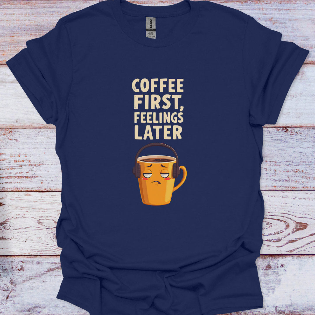 Navy blue t-shirt with a coffee-themed graphic and text on a wooden surface