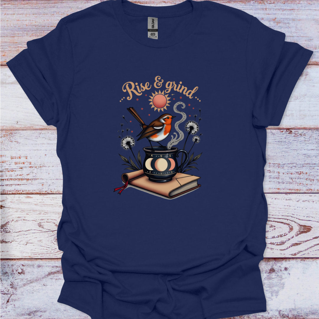 Navy blue t-shirt with a graphic design featuring a bird, sun, and coffee cup on a wooden surface.