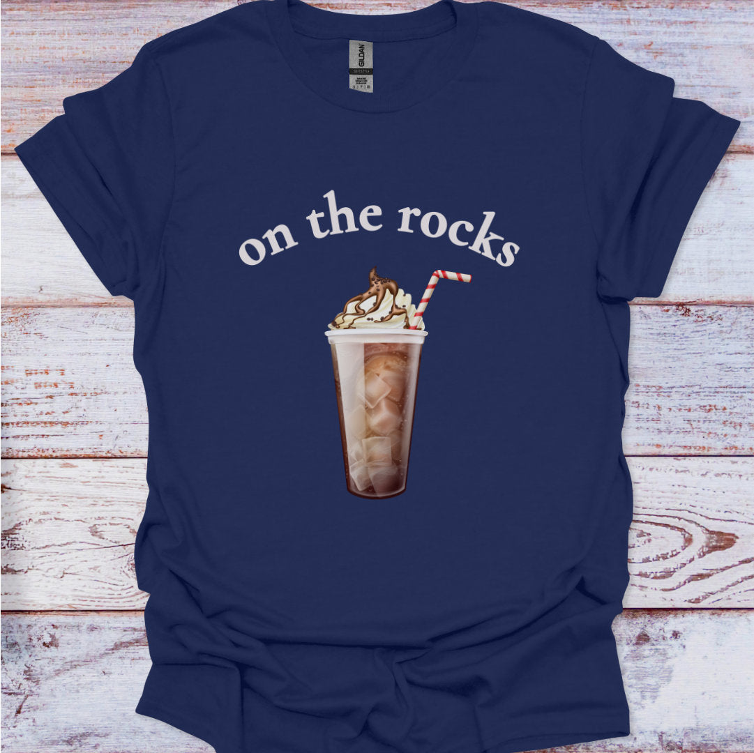 Navy blue t-shirt with a graphic of an iced coffee and text 'on the rocks' on a wooden surface.
