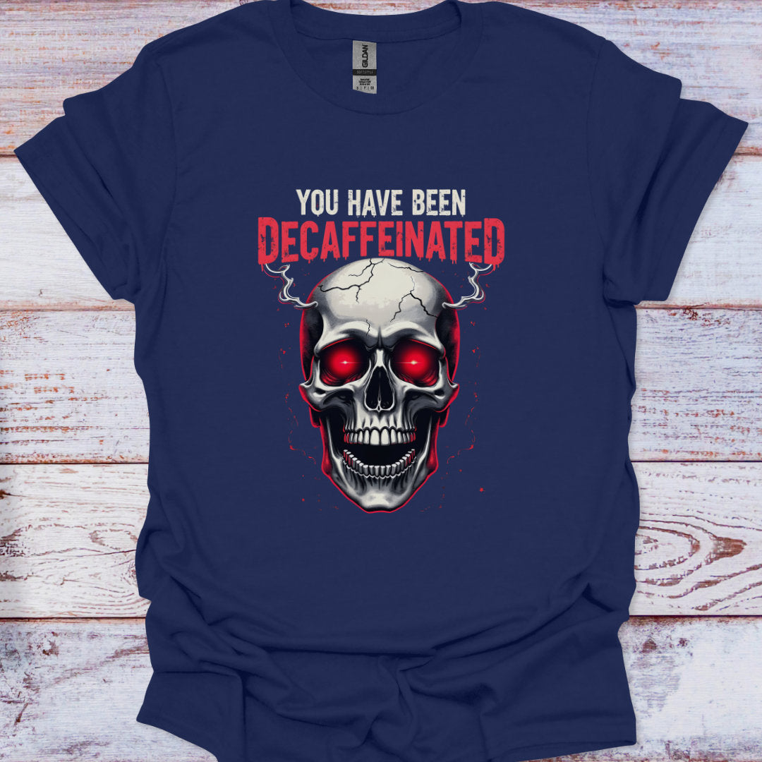 Navy blue t-shirt with a graphic of a skull and text 'YOU HAVE BEEN DECAFFEINATED' on a wooden surface.