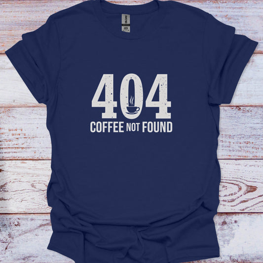 Navy blue t-shirt with '404 Coffee Not Found' text on a wooden surface