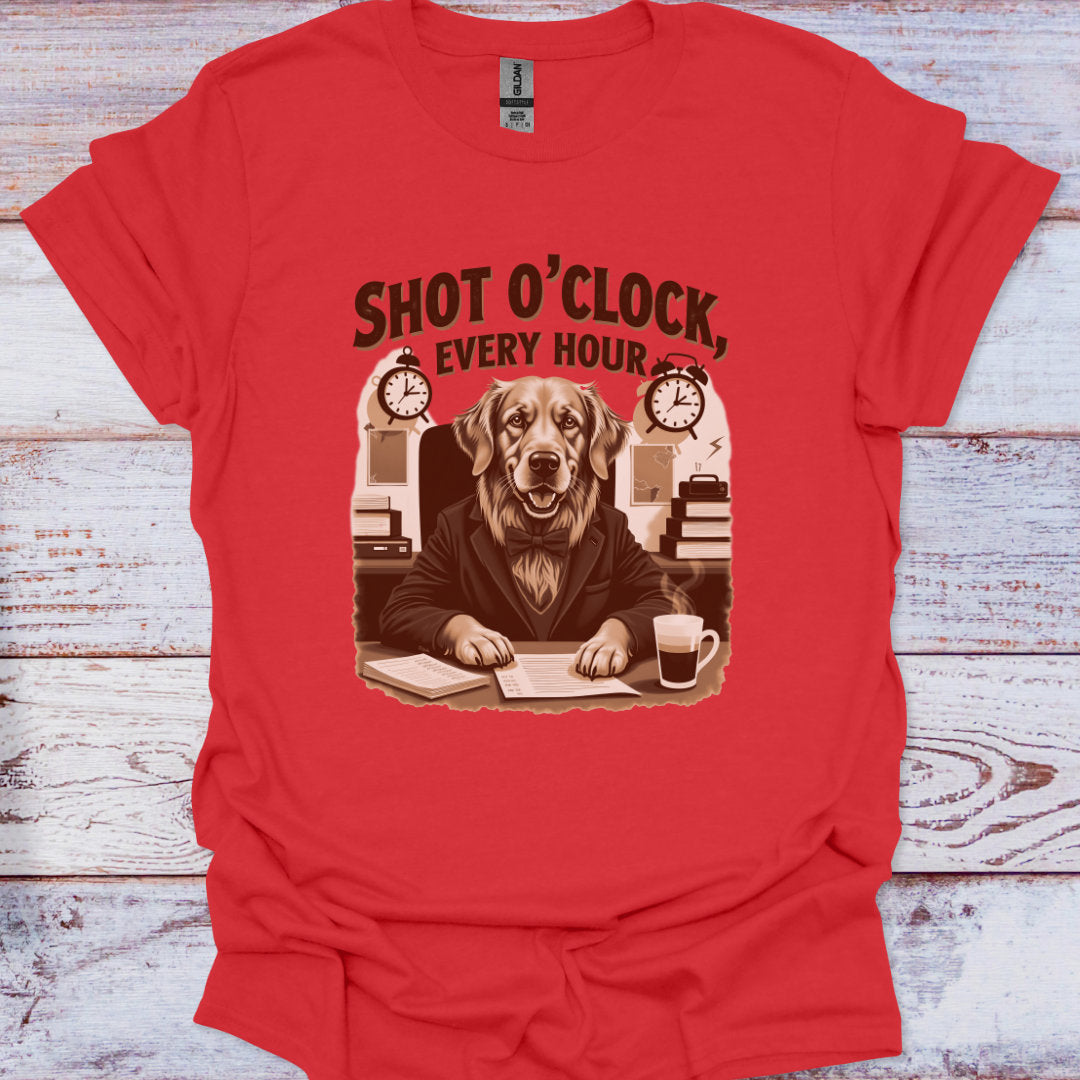 Red t-shirt with a dog at a desk and 'Shot O'Clock, Every Hour' text on a wooden surface.
