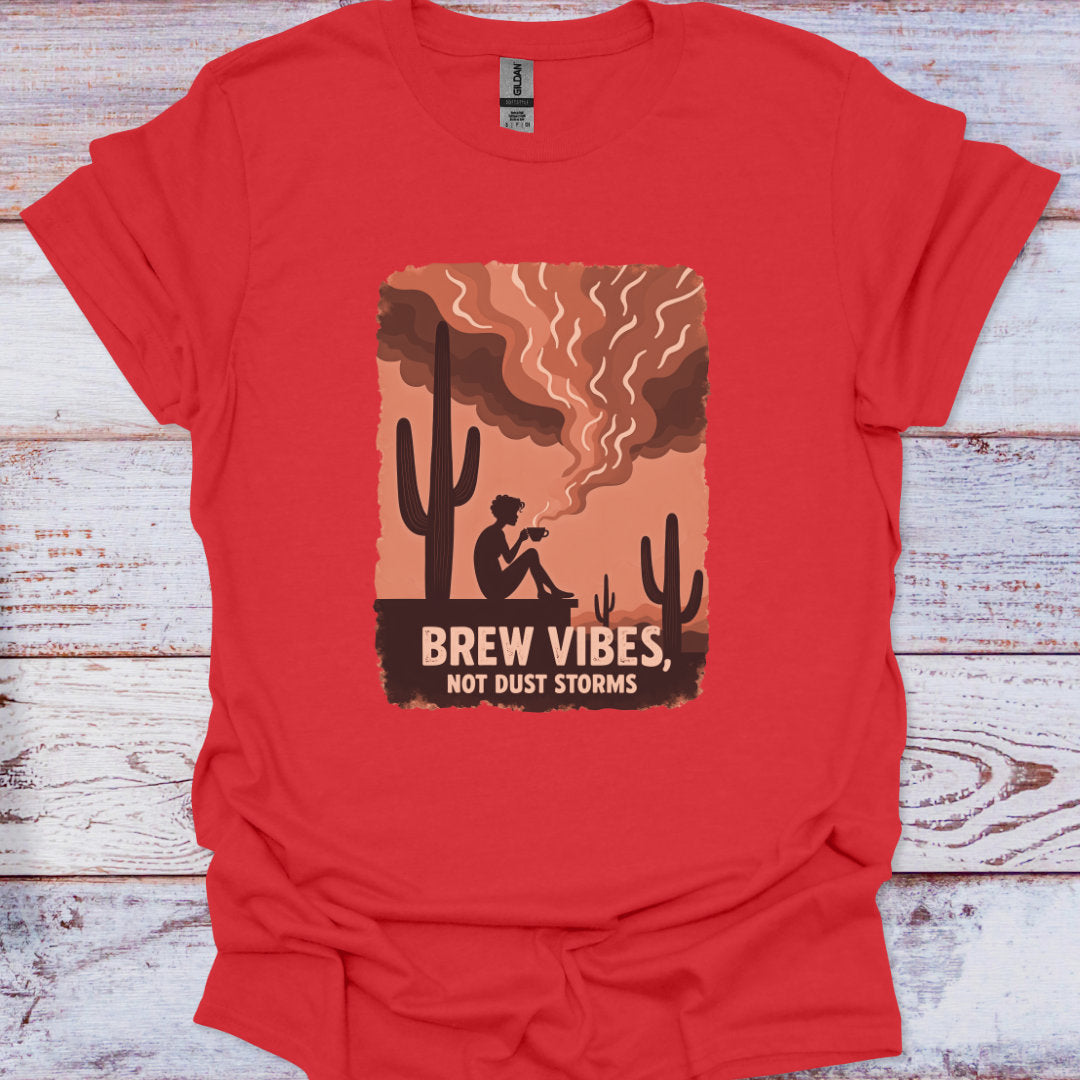 Red t-shirt with a graphic design featuring a cactus and text on a wooden surface