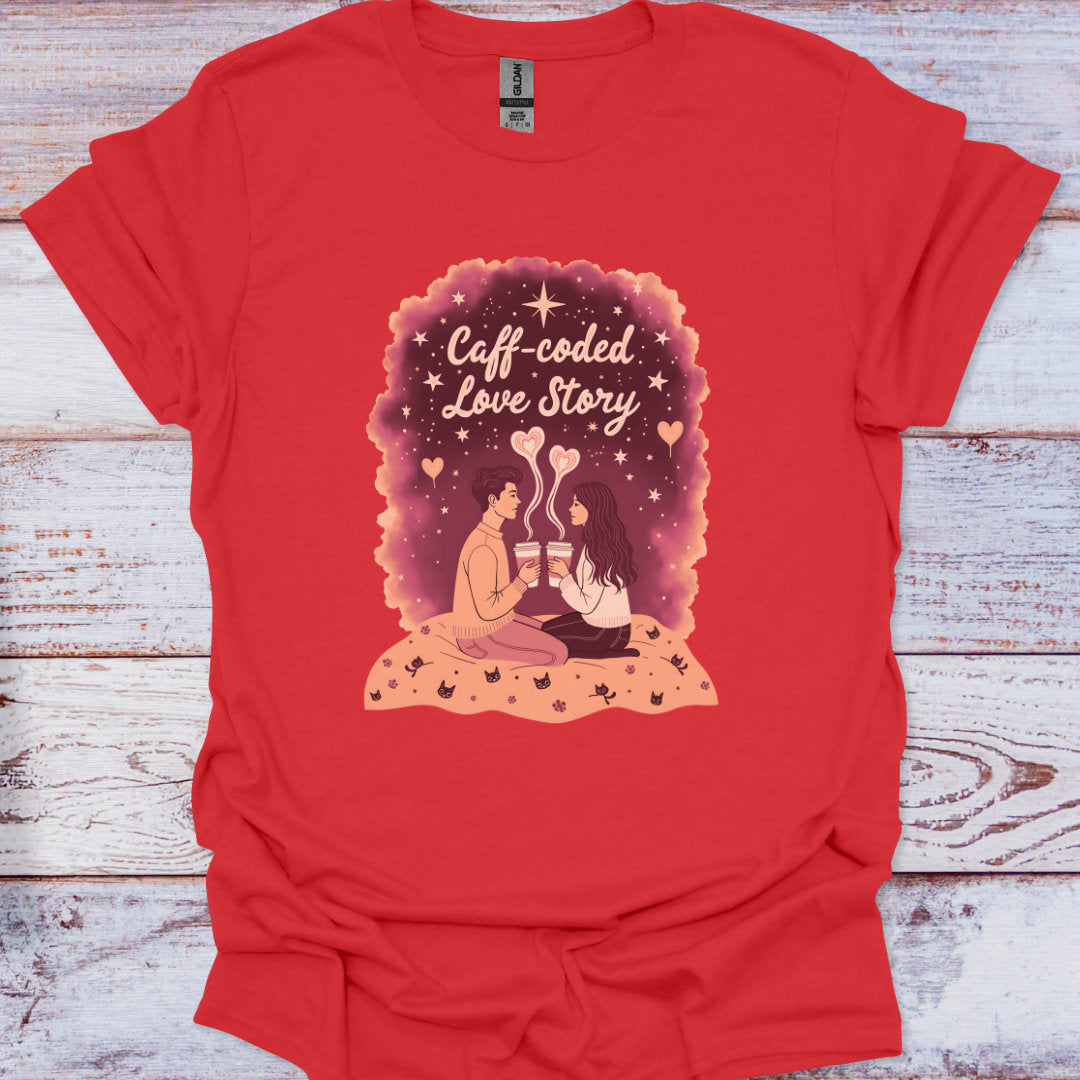 Red t-shirt with 'Caff-coded Love Story' graphic on a wooden surface