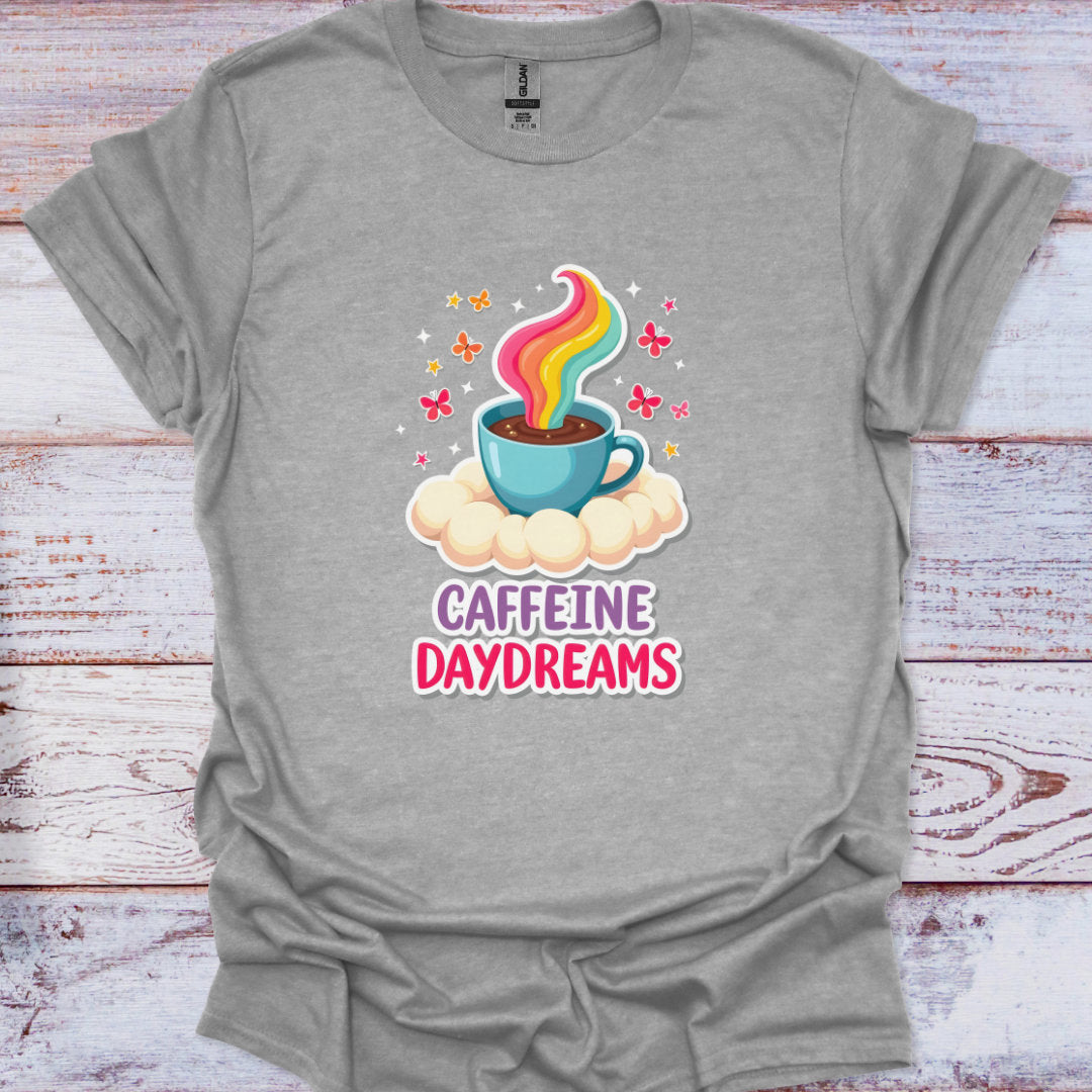 Gray t-shirt with a colorful coffee cup graphic and 'Caffeine Daydreams' text on a wooden surface.