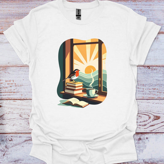 White t-shirt with a colorful graphic of a window, books, a cup, and a bird on a wooden surface.