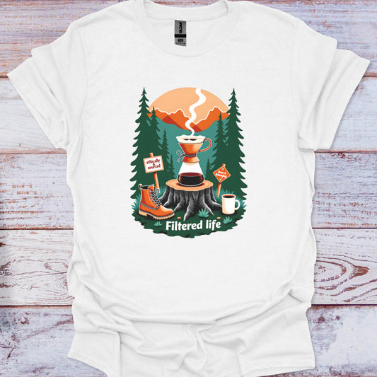 White t-shirt with a coffee-themed graphic on a wooden surface