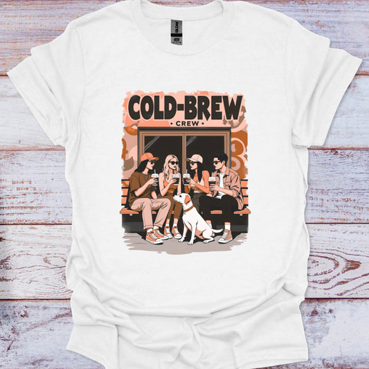 White t-shirt with 'Cold-Brew Crew' graphic on a wooden surface