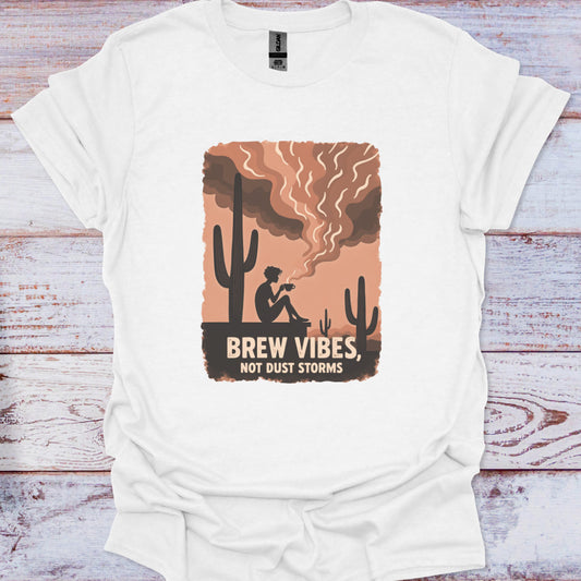 White t-shirt with a graphic design featuring a cactus and text on a wooden surface