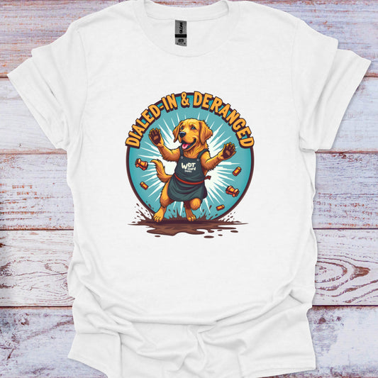White t-shirt with a graphic of a dog and text 'Dialled-In & Deranged' on a wooden surface.