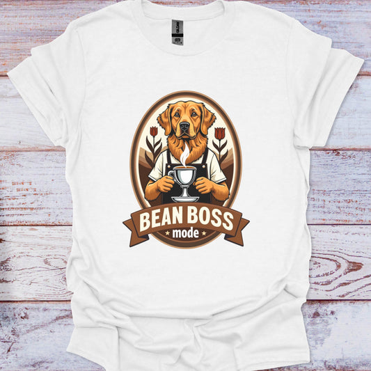 White t-shirt with a graphic of a dog holding a coffee cup and 'Bean Boss' text on a wooden surface.
