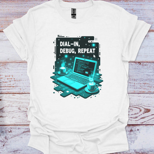 White t-shirt with a graphic design of a laptop and text 'Dial-In, Debug, Repeat' on a wooden surface.