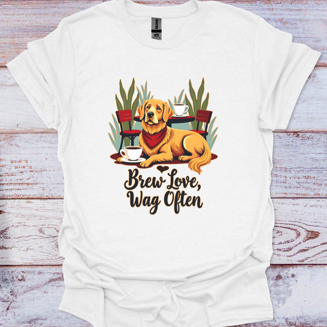 White t-shirt with a dog graphic and text 'Brew Love, Wag Often' on a wooden surface.