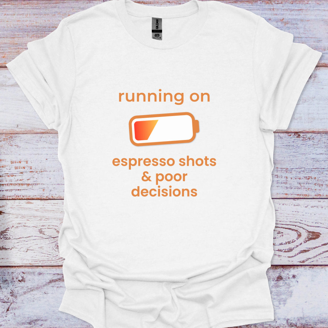 White t-shirt with orange text and battery icon on a wooden surface