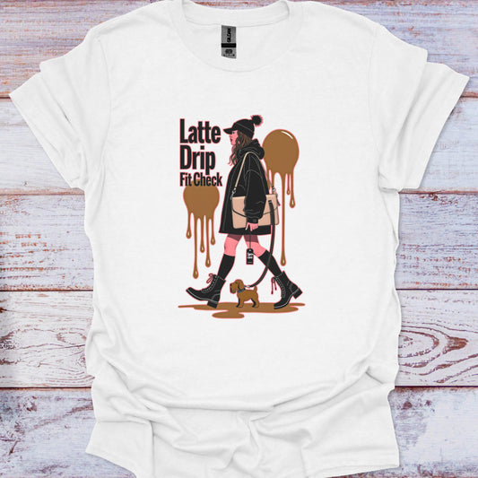 White t-shirt with a graphic design of a woman holding a coffee cup and text 'Latte Drip Fit Check' on a wooden surface.